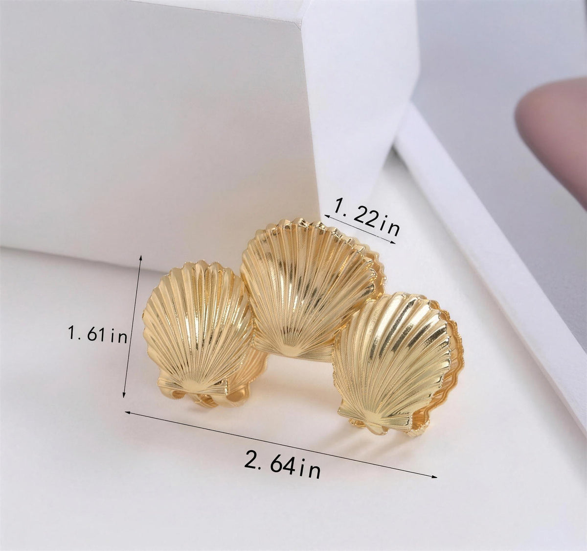 Clam shell hair claw measurements: 2.64 in wide, 1.61 in tall