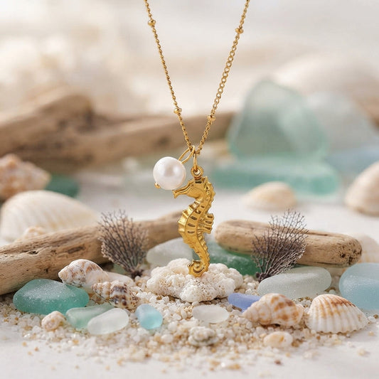 Gold seahorse and faux pearl pendant necklace