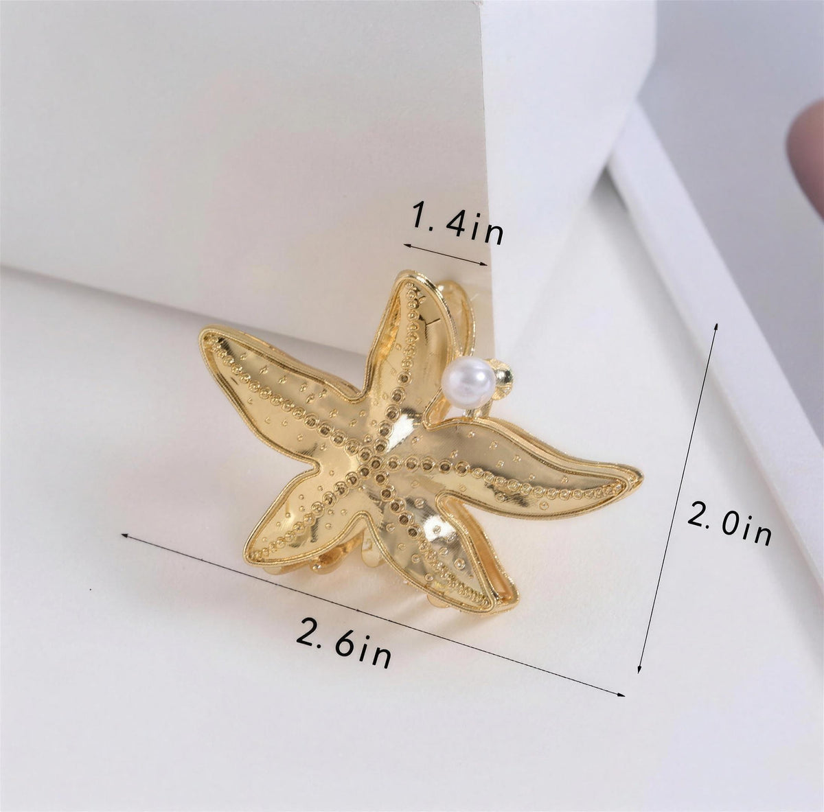Starfish hair claw measurements: 2.6 in wide, 2.0 in tall